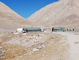 24 Tamdrin Seasonal Food And Beverage Tents In The Lha Chu Valley On Mount Kailash Outer Kora We stopped for a small lunch at the Tibetan seasonal nomad tents of Tamdrin (4893m) in the Lha Chu Valley. Tamdrin is named for the nearby self-arising image of Tamdrin (Hayagriva) on a rock.